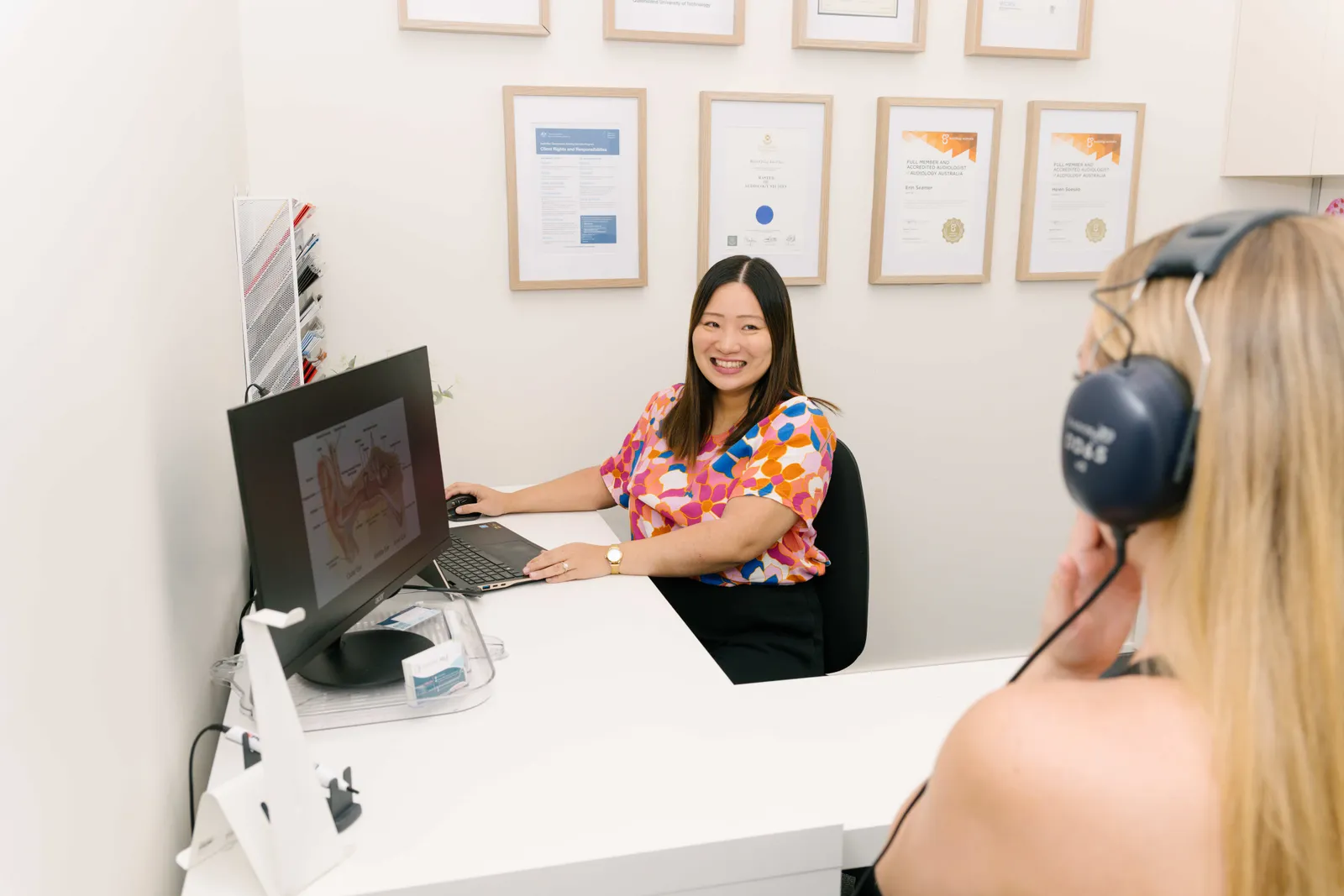 The Hearing Help audiologist with a client